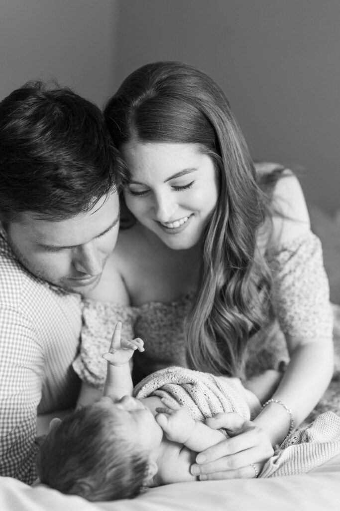 newborn with mom and dad photos