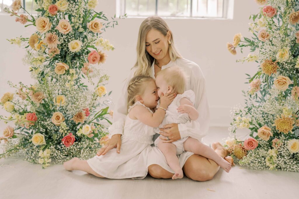 motherhood sessions with flowers